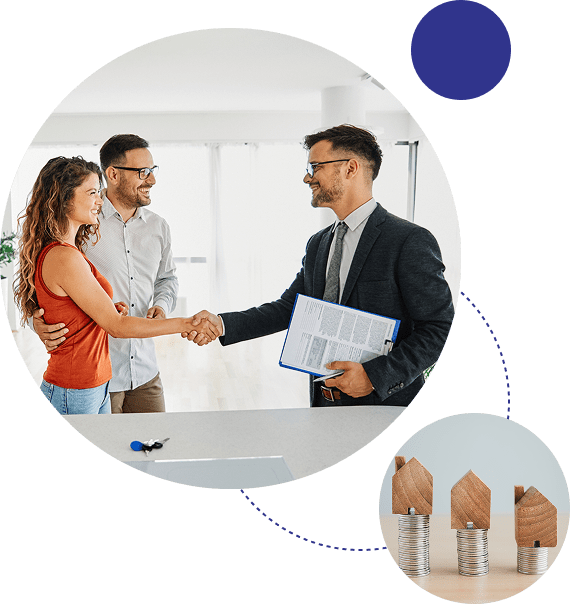 Couple shaking hands with a professional in a business setting.